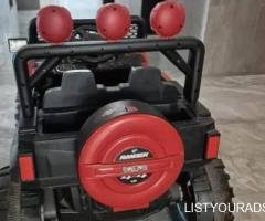 Rechargeable 2 seater car with music. Manual and remote control.